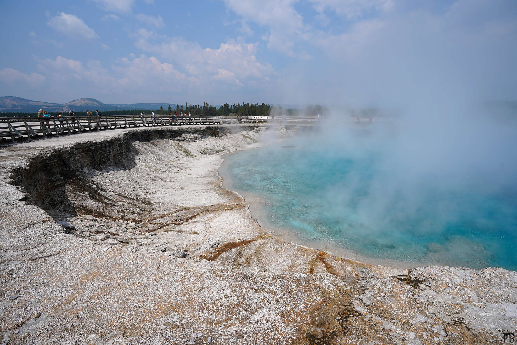 A very large and blue hot spring