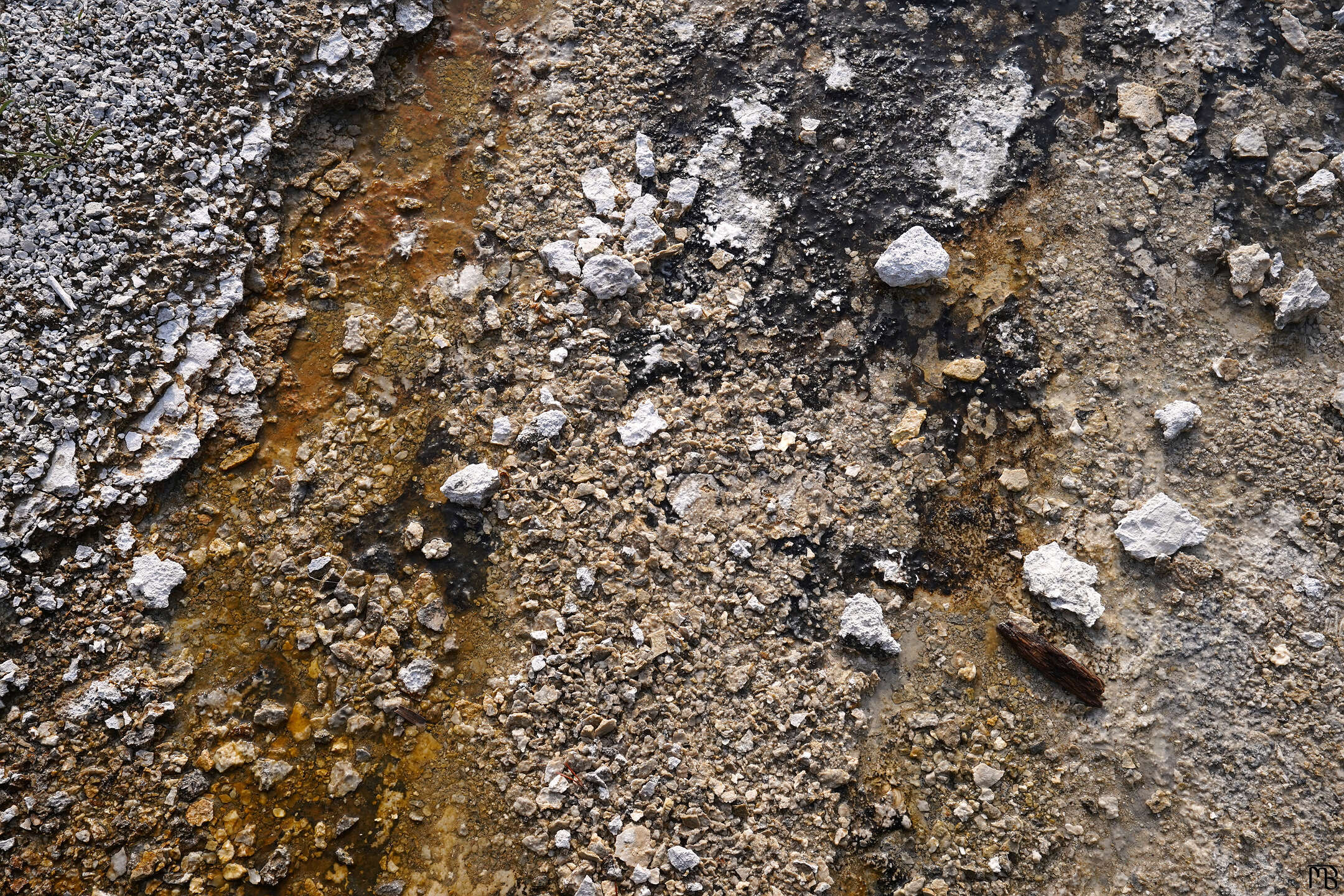 Orange run off with white rocks