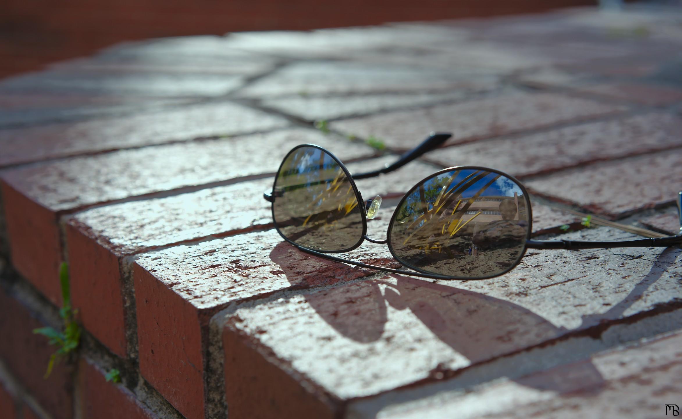 Sun glasses on brick