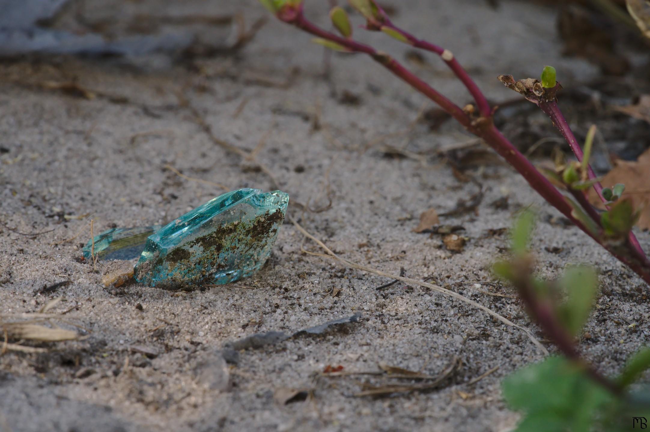 Glass in dirt