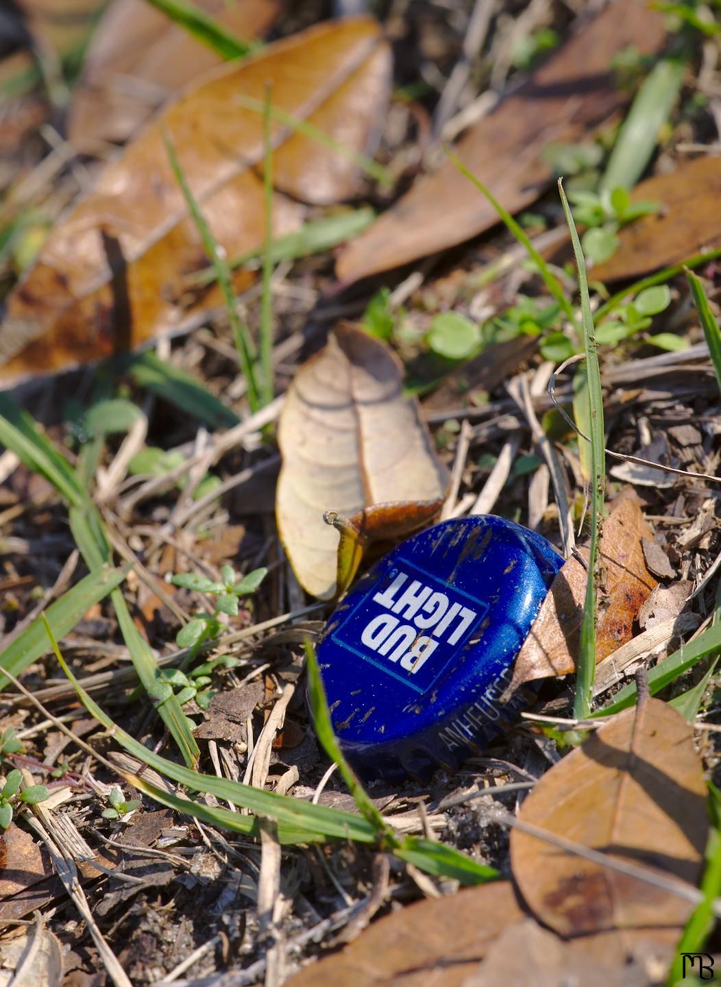 Bottle cap on ground (not a sponsor)