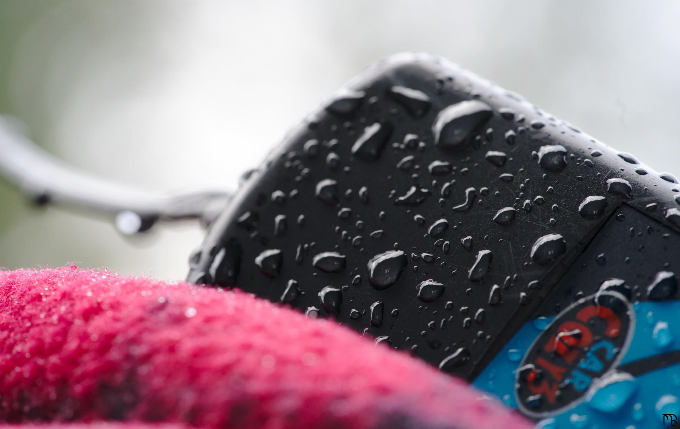 Rain drops on box and red fabric