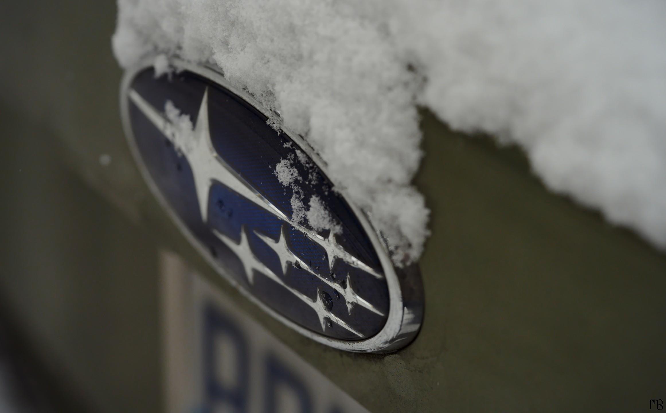 Subaru logo with snow