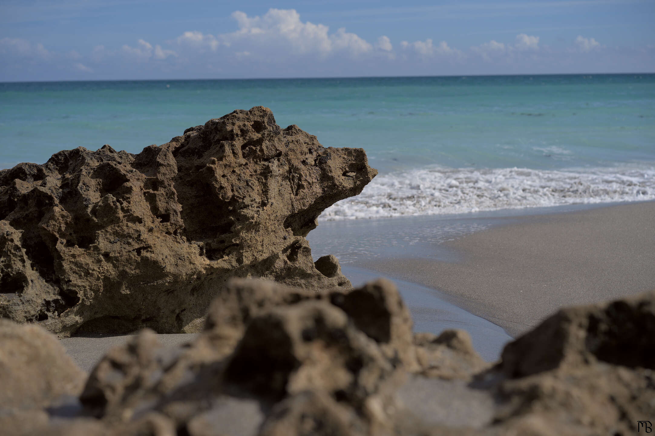 Rock outcrop with ocean wave