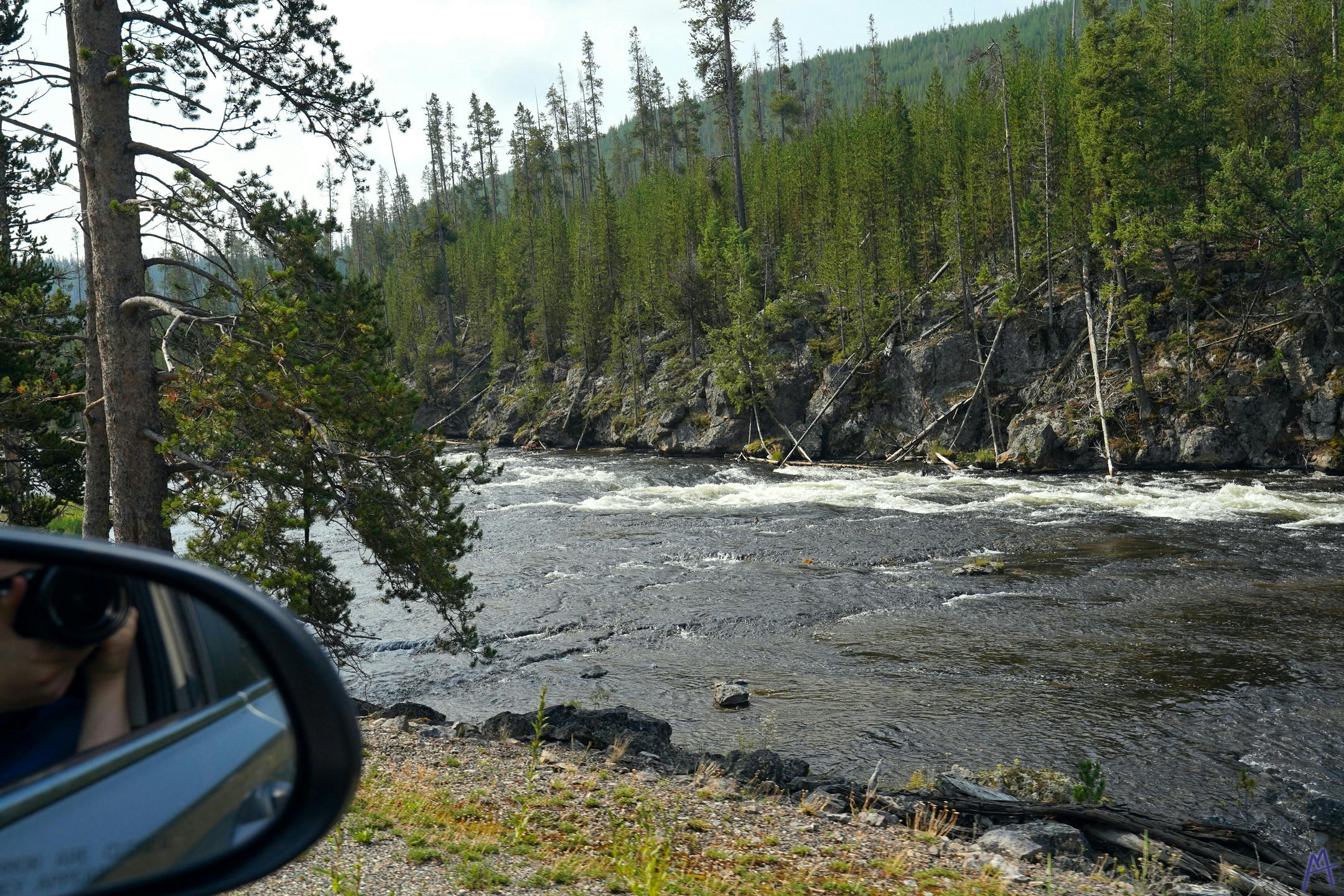 Rushing river through car at Yellowstone