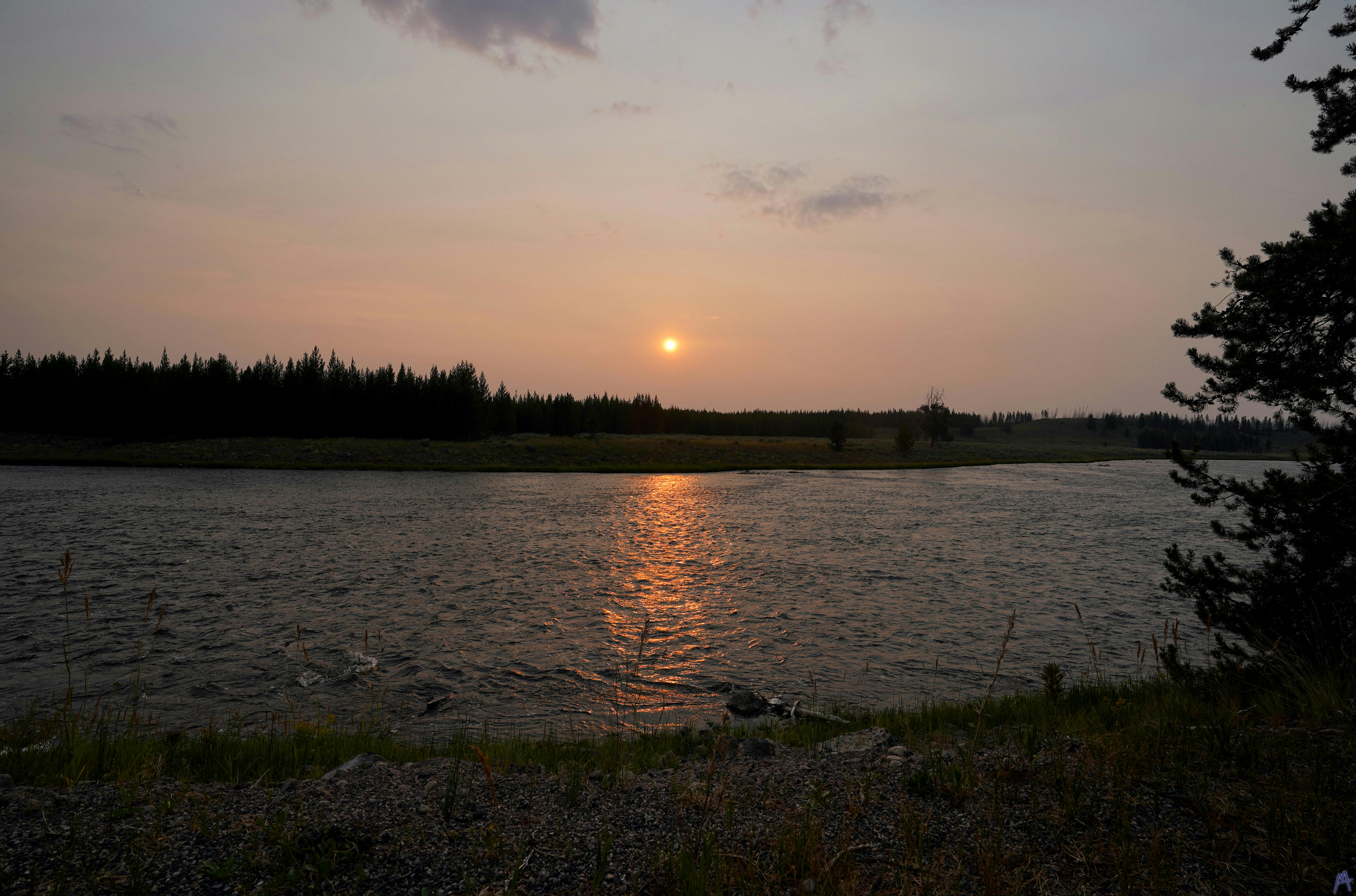 Sunset over a river at Yellowstone