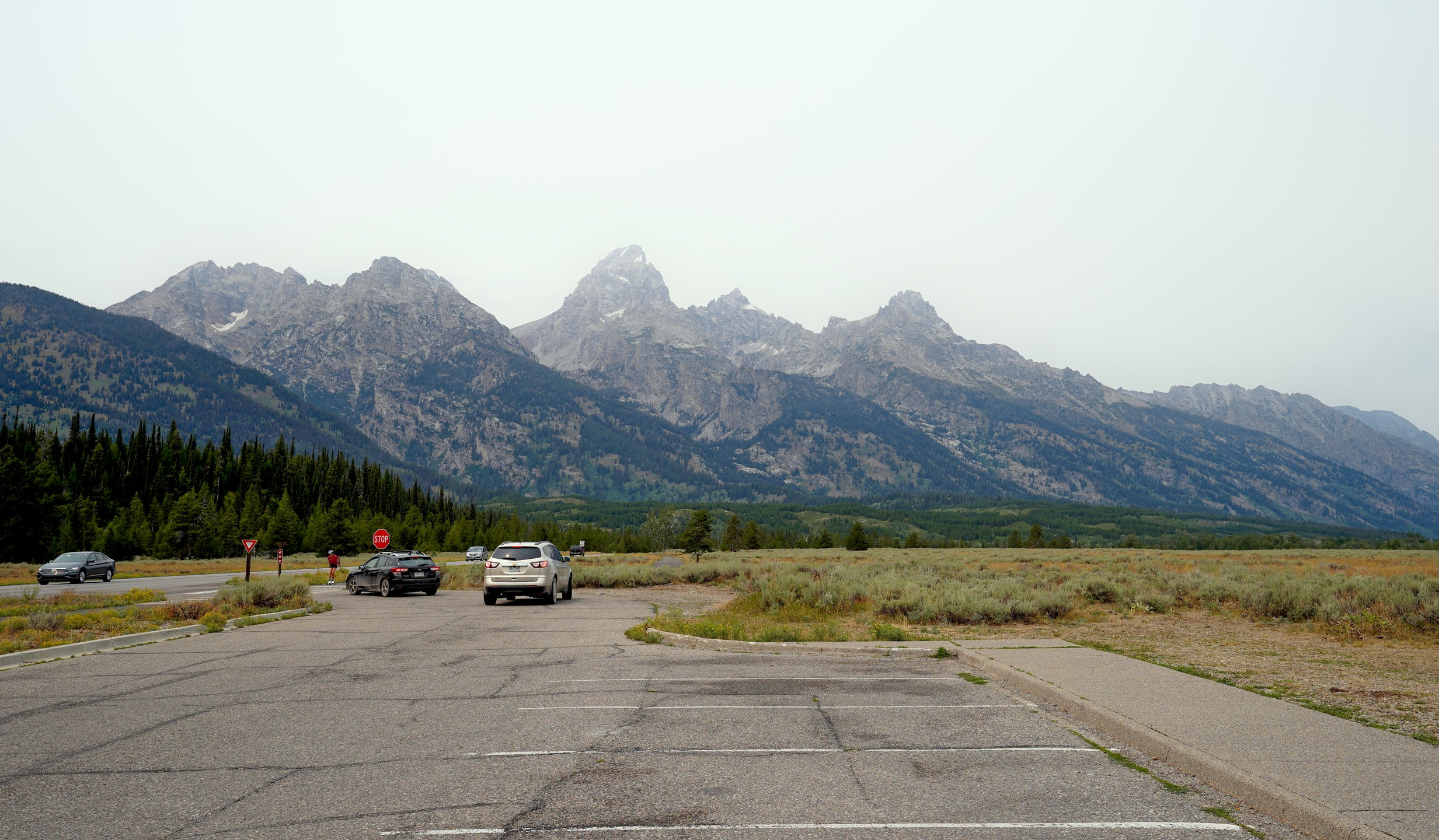 Mountains in a row near a parking area at Grand Teton