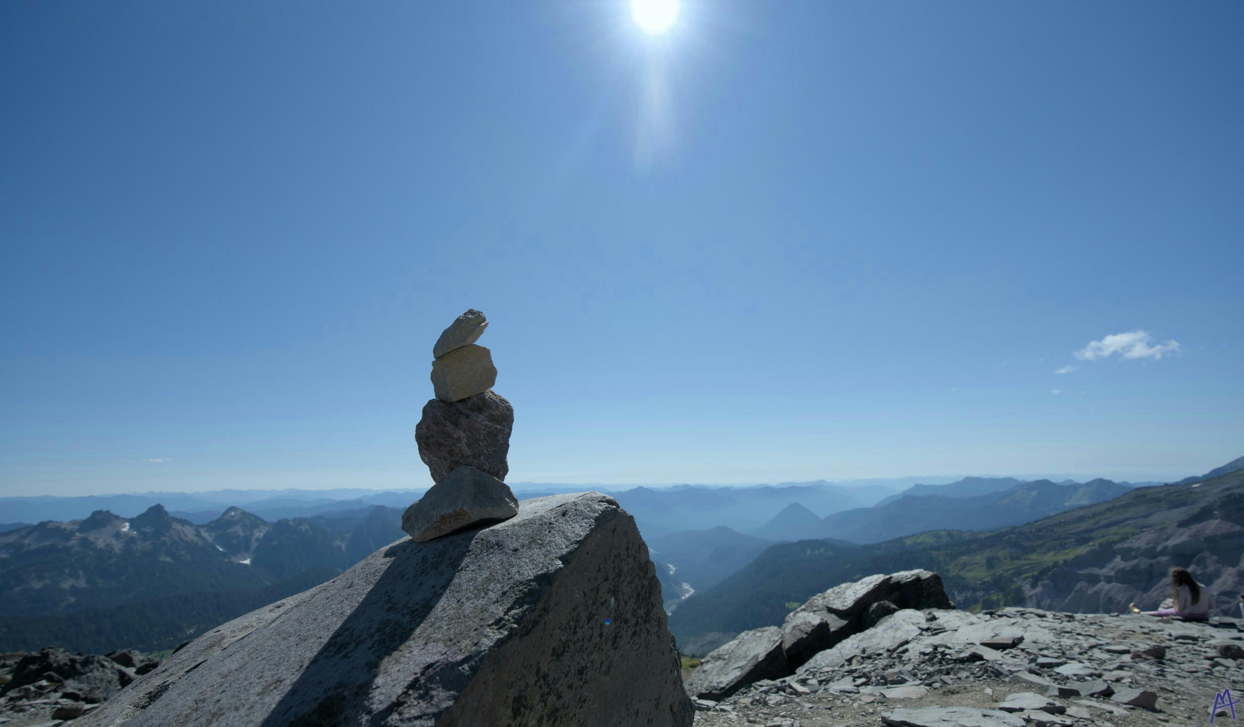 Pile of rocks near the blue horizon at Rainier