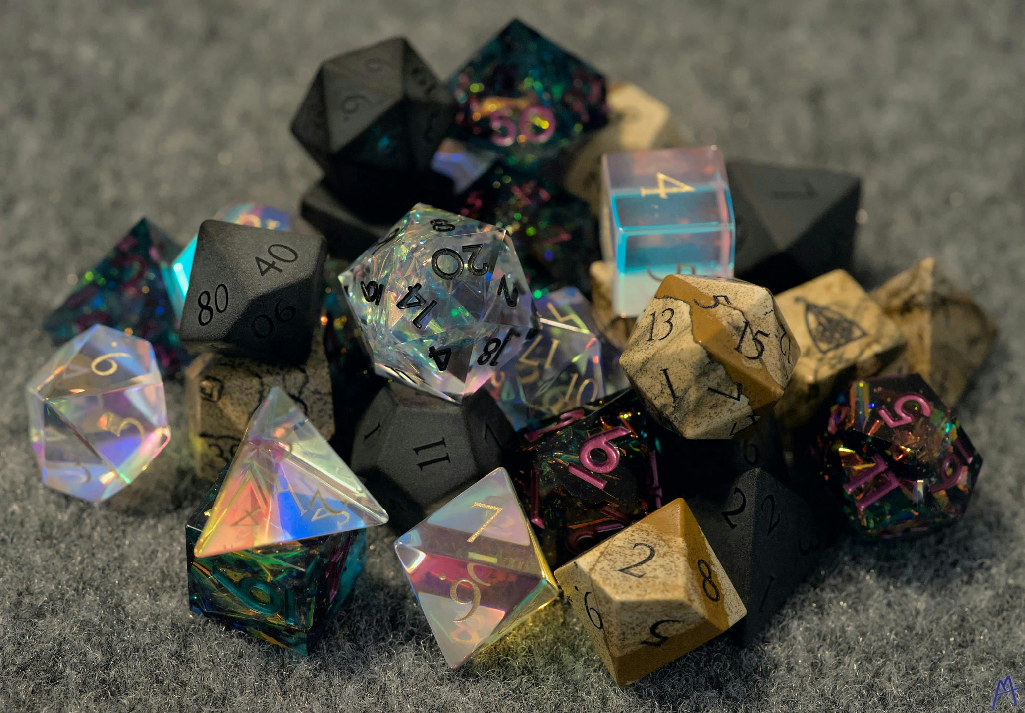 Pile of glass, plastic, and stone dice