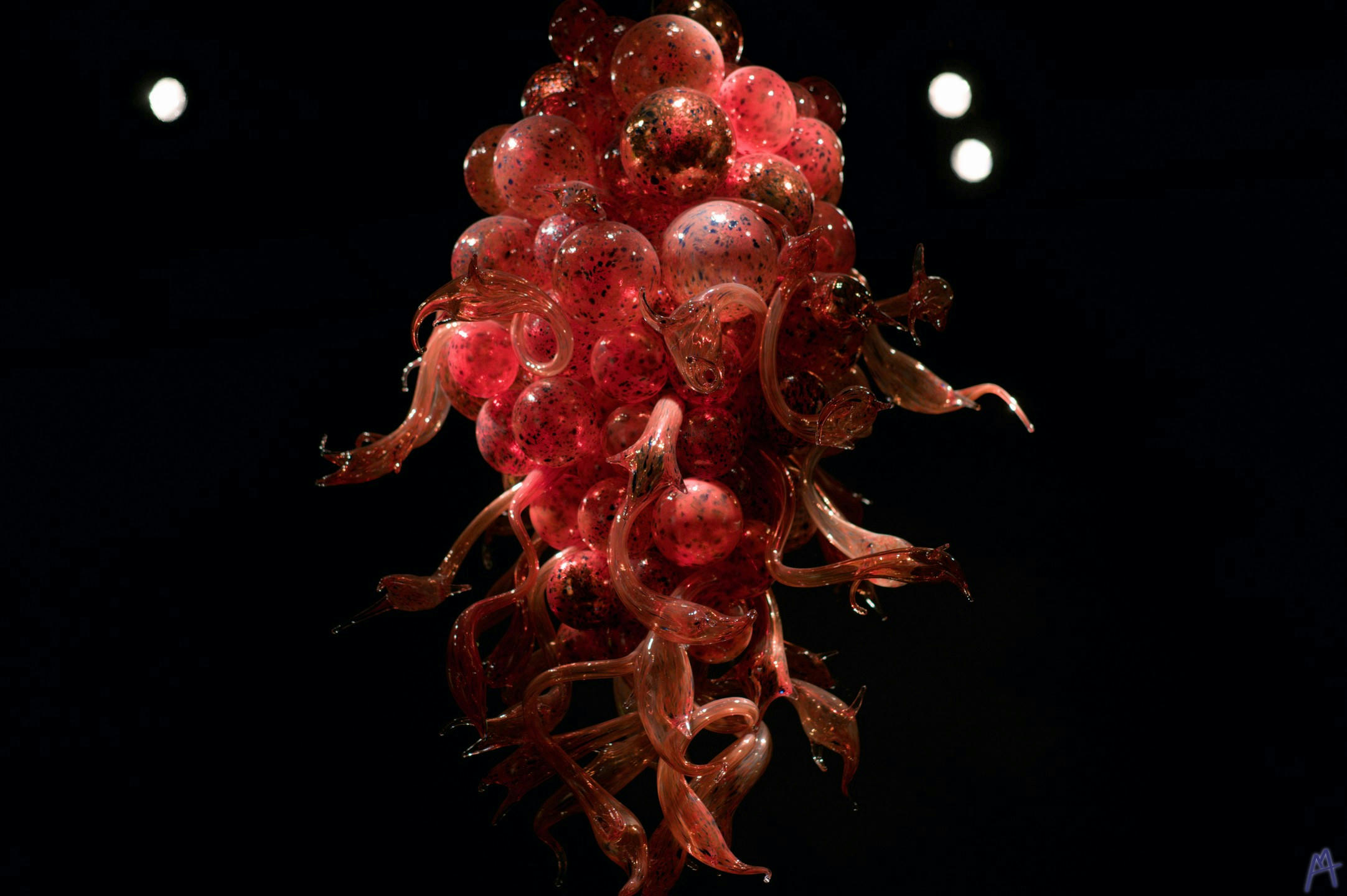 Floating red and bubbly glass sculpture