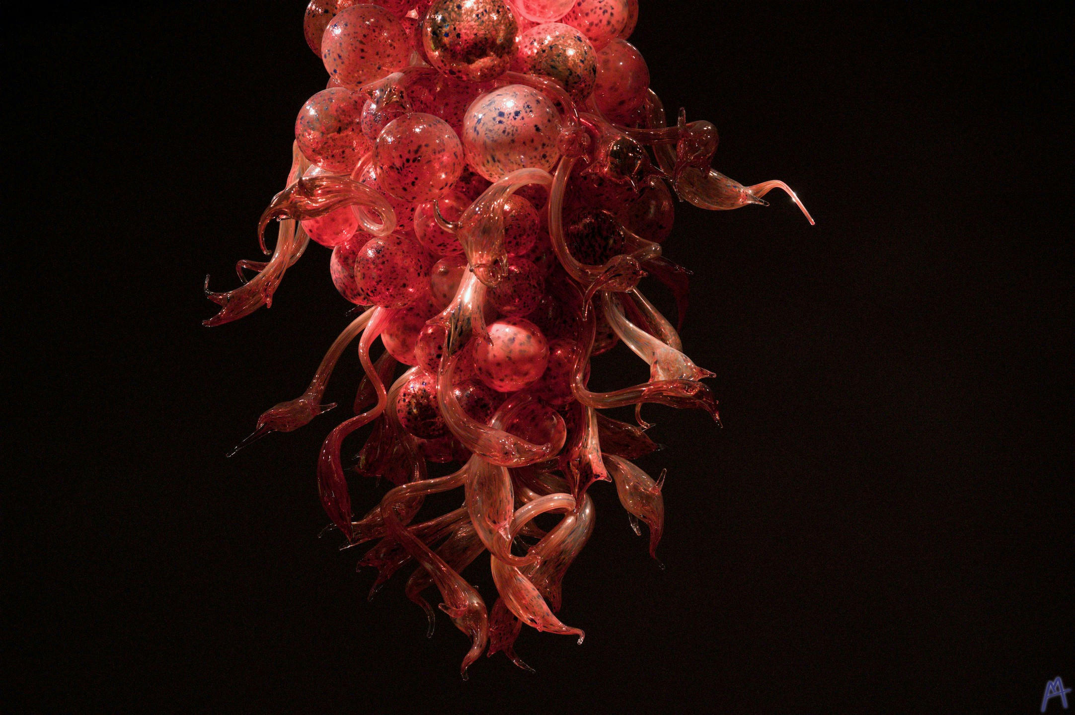 Red and black hanging glass sculpture