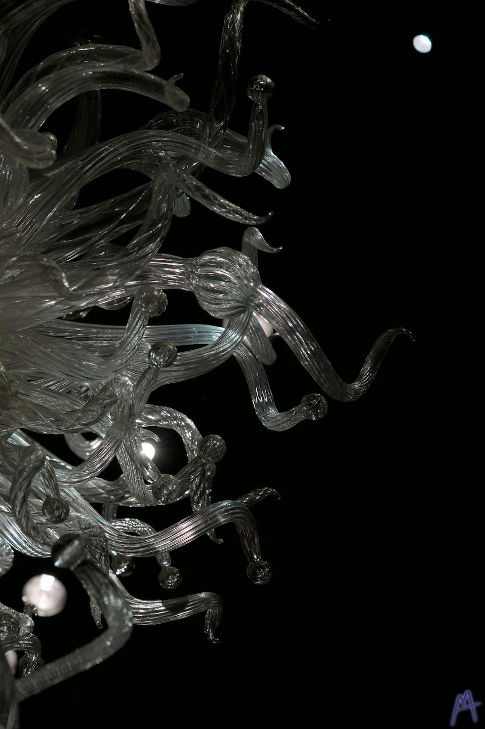 White and clear glass sculpture hanging