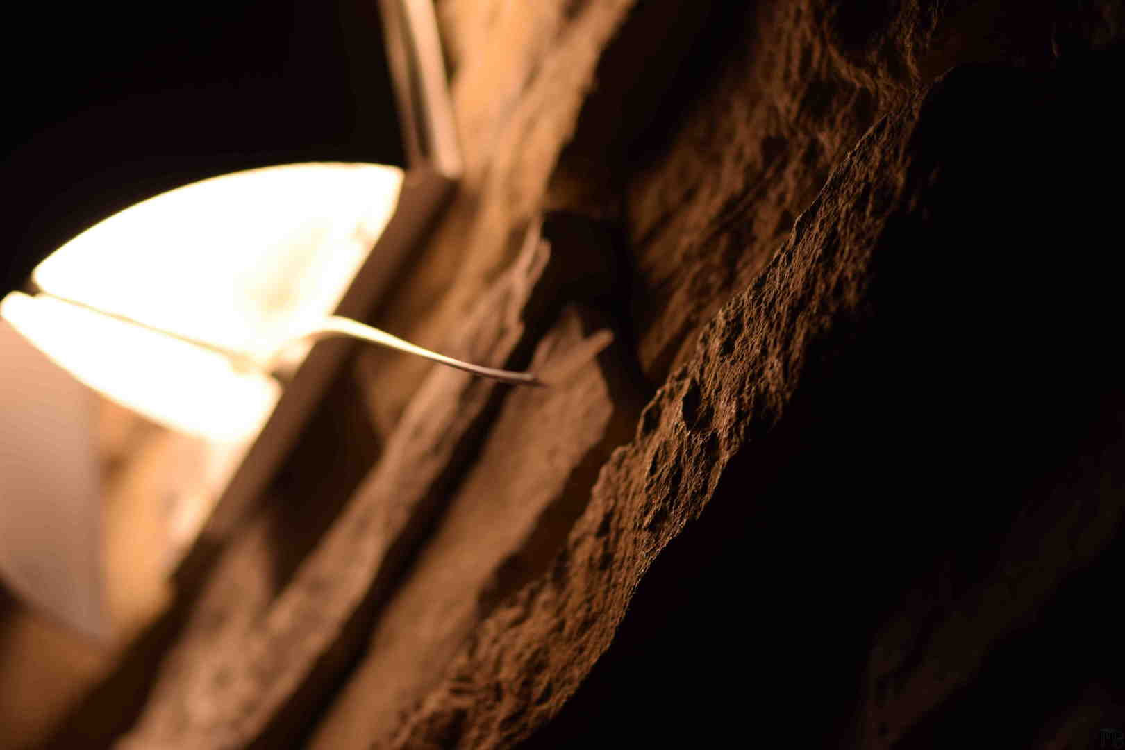 Brick under the light at night