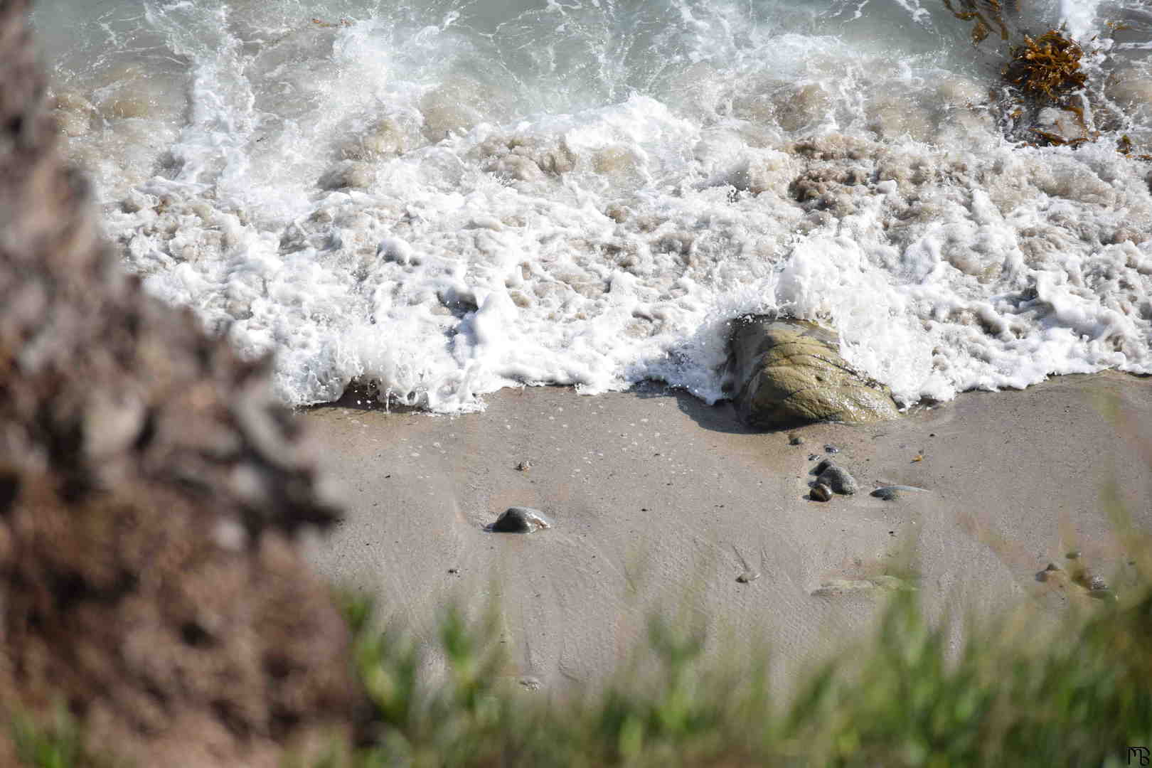 Water crashing against rock