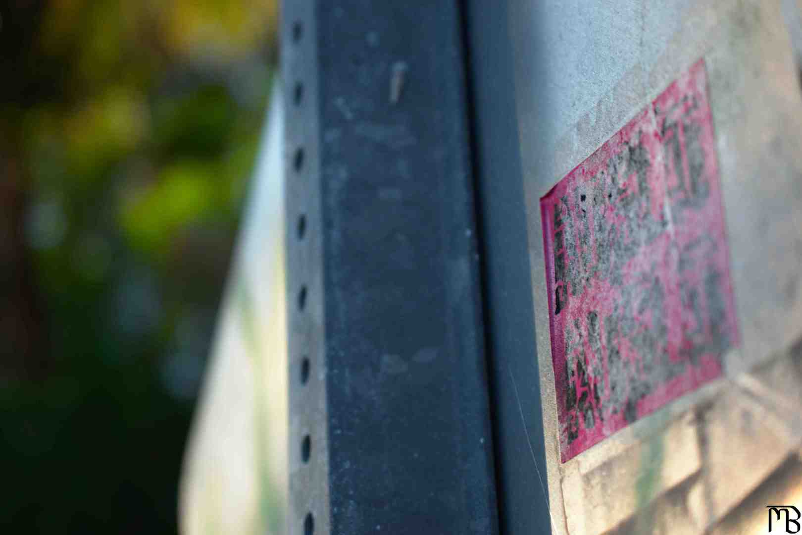 Backside of stop sign with sticker