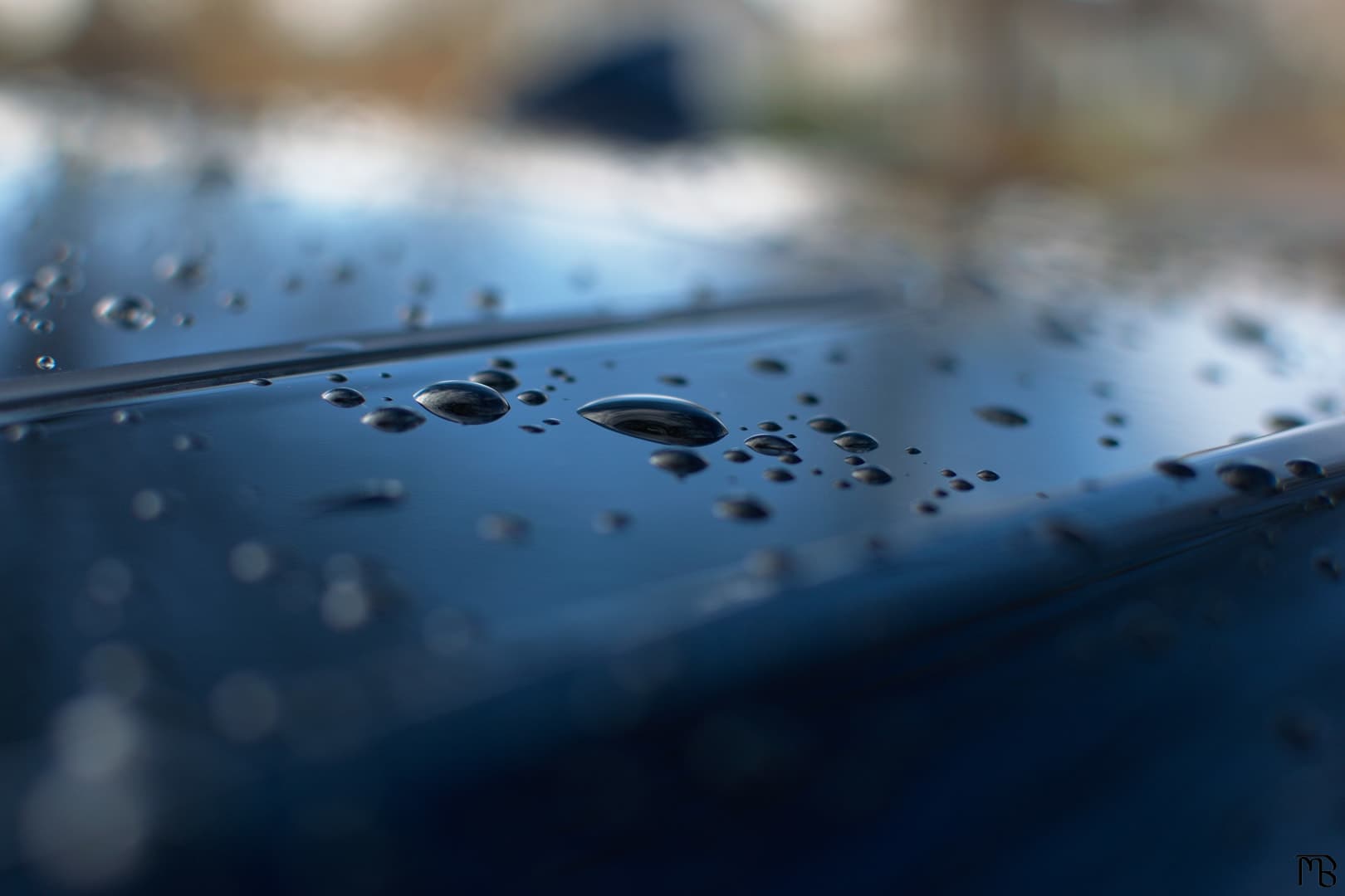 Water beads on car